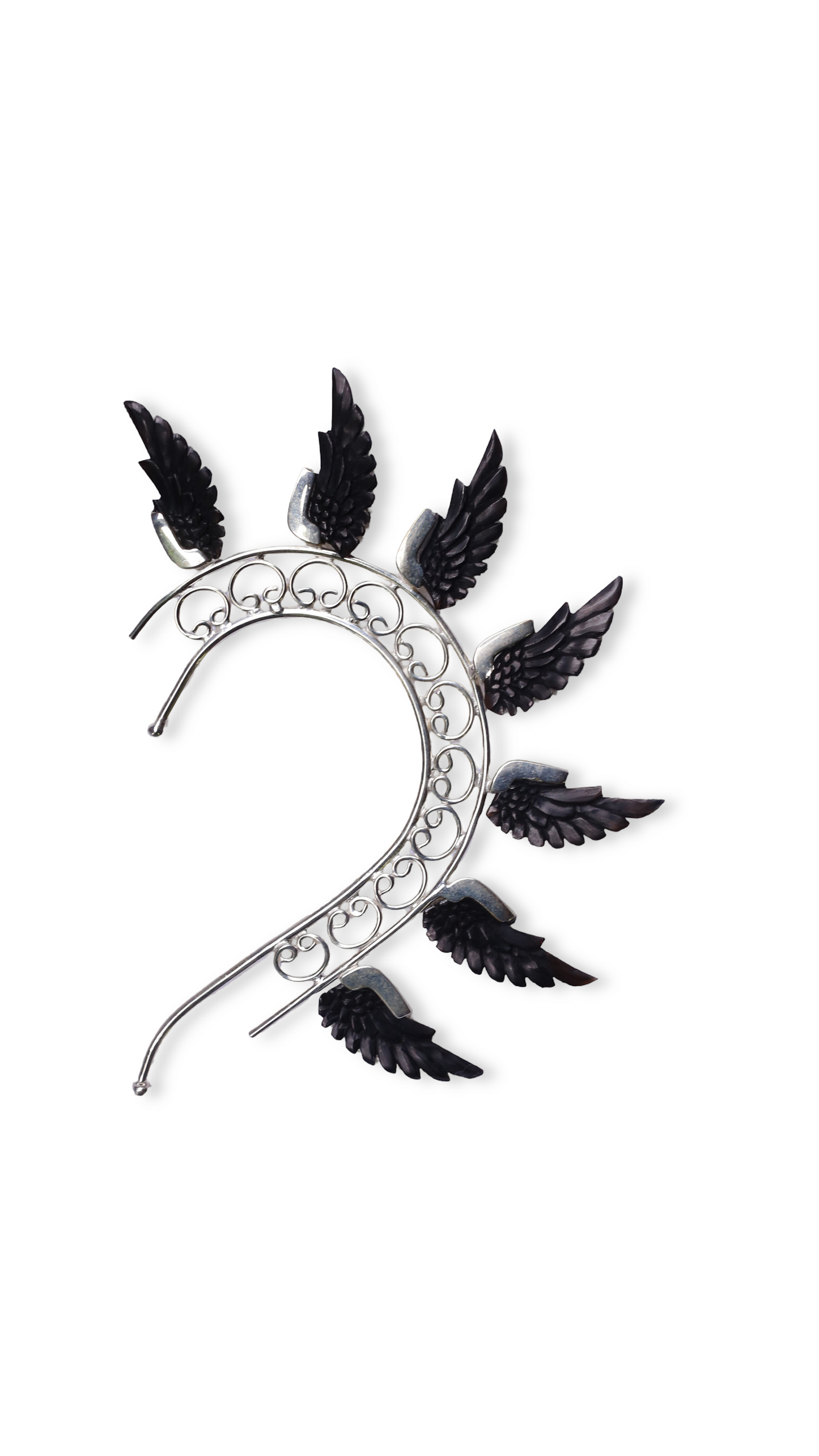 Decorative headband with black feather-like attachments on a white background