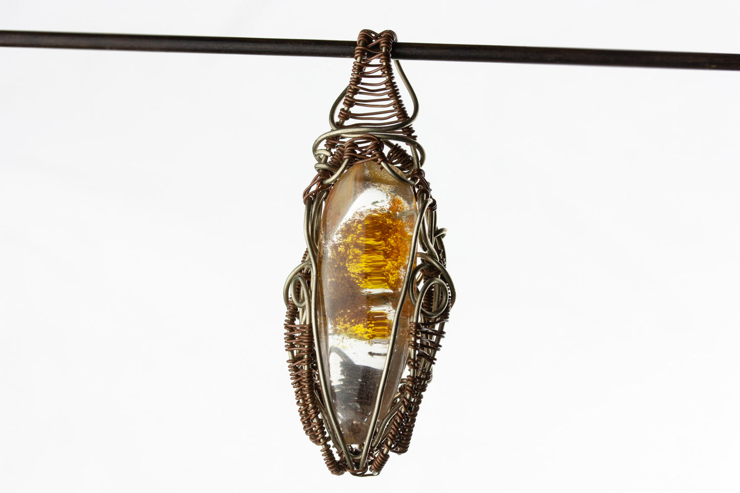 Wire-wrapped mystic jewellry from India combines the power of healing stones with natural metal elements. Handmade, unique, tree agate gemstone pendant.