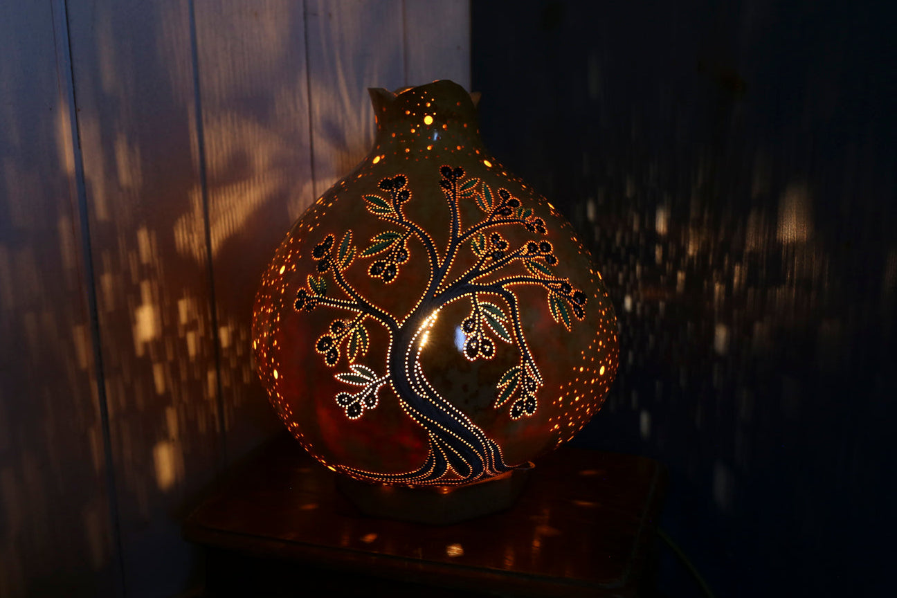 Lámpara de calabaza con resplandor tranquilo