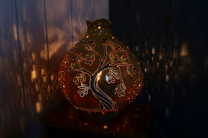 Lámpara de calabaza con resplandor tranquilo