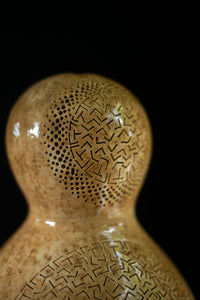 Handcrafted, Calabash lamp, Dried gourd, Intricate carving, Patterns, Soft light, Elegance, Decoration, Unique design, Warm glow.