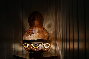 Collection, Calabash lamps, Unique, Carvings, Sizes, Serene ambiance, Soft glow, Decorative lighting, Elegance, Patterns, Doti sutra