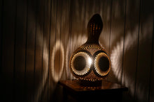 Load image into Gallery viewer, handcrafted artistry, interconnected symbolism, natural elegance, intricate patterns, meaningful decor, artistic expression, serene ambiance, growth and unity, soulful illumination, profound craftsmanship, balanced design, symbolic radiance, meaningful symbolism, symbolic tree motif, aesthetic significance, nature-inspired lamp, artisanal elegance, symbolic artistry, handmade lamp.