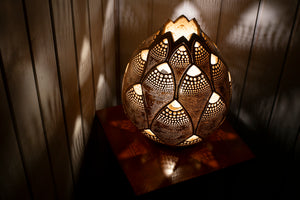Calabash lamps, online sale, Switzerland, decorative lighting, handmade lamps, unique designs, ambient illumination, gourd artistry, Swiss decor, artisanal lighting, crafted elegance, Swiss interiors, natural ambiance, buy calabash lamps, Swiss craftsmanship, interior design, lighting fixtures, Swiss home decor, shopping online, authentic gourd lamps.