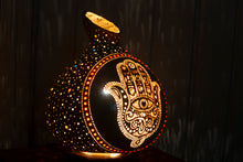 Load image into Gallery viewer,  calabash lamp, handcrafted gourd lamp, unique light decoration, artisanal illumination, gourd art lamp, decorative ambience lighting, carved calabash lamp, natural elegance decor, artistic gourd lighting, handmade lamp design, custom gourd light, organic ambiance fixture, crafted gourd glow, creative light patterns, rustic home lighting, gourd craftsmanship, art-inspired lamp, serene ambiance creation, cultural gourd art, and illuminating craftsmanship, fatma s hand