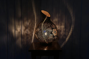 Gourd lamp, home decor, lighting, Handcrafted, artisanal, ambiance, Bodrum-inspired, coastal charm, natural beauty, Unique design, elegance.