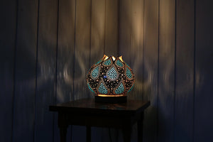 Handcrafted gourd lamp, coastal-inspired design, artisanal craft, ambient lighting