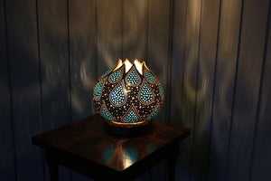 Handcrafted gourd lamp, coastal-inspired design, artisanal craft, ambient lighting