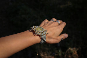Handmade, unique macrame bracelet with gemstones. 