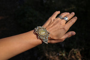 Handmade, unique macrame bracelet with gemstones. 