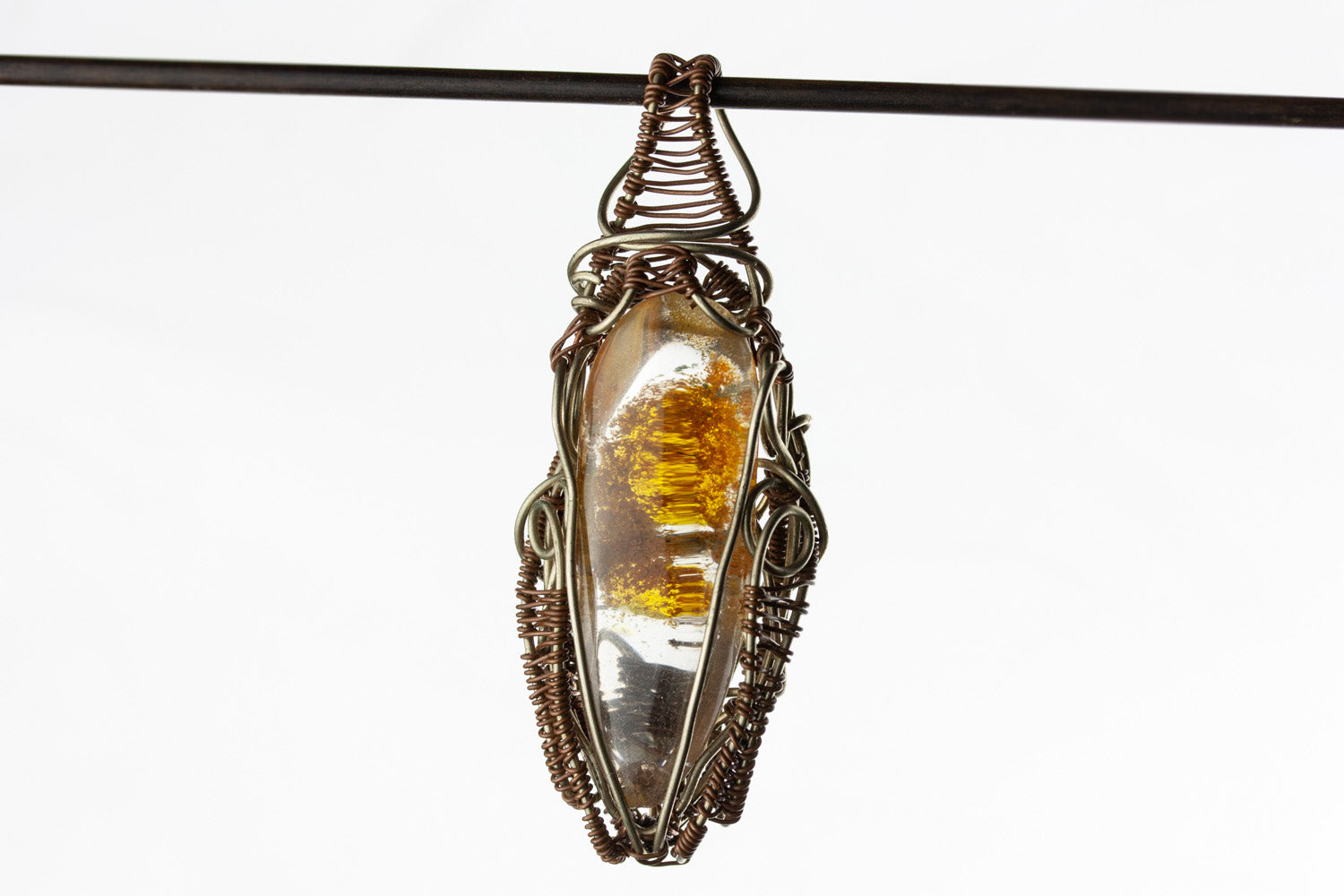 Wire-wrapped mystic jewellry from India combines the power of healing stones with natural metal elements. Handmade, unique, tree agate gemstone pendant. 