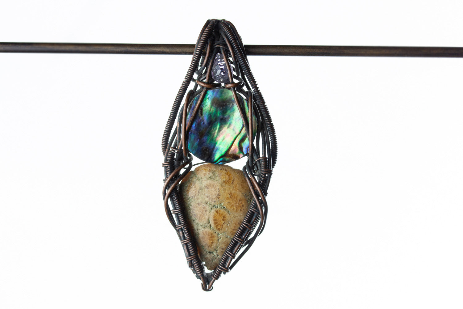 Wire-wrapped mystic jewellry from India combines the power of healing stones with natural metal elements. Handmade, unique, tree agate gemstone pendant. 