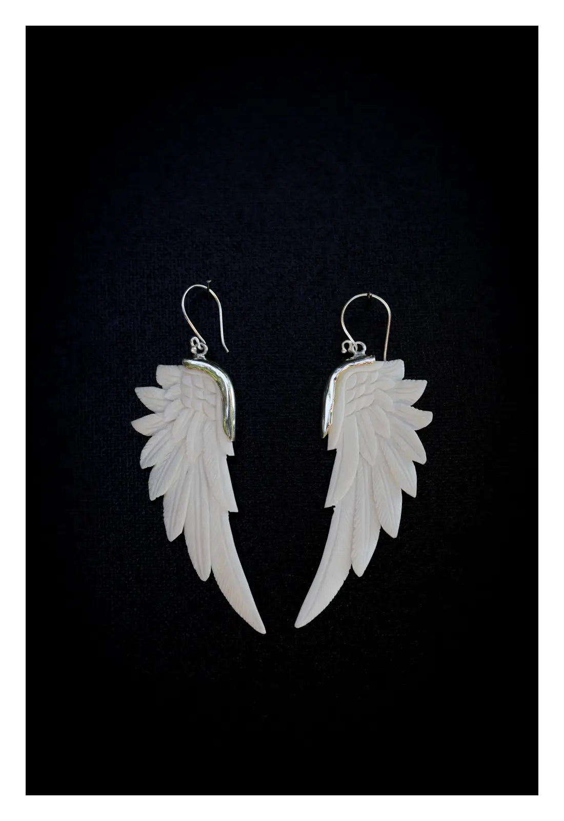 Pendientes de alas blancas de Bali