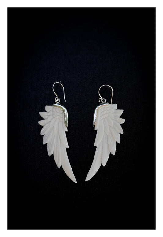 Pendientes de alas blancas de Bali